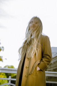 blonde woman in heels posing