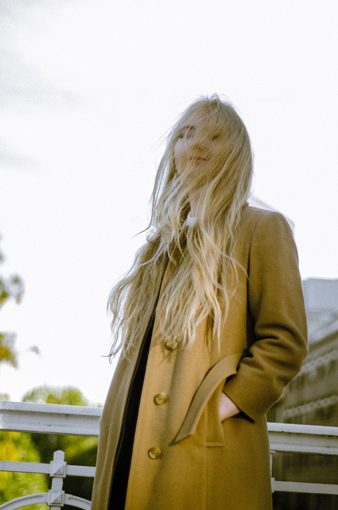 Blonde hair woman smiling 