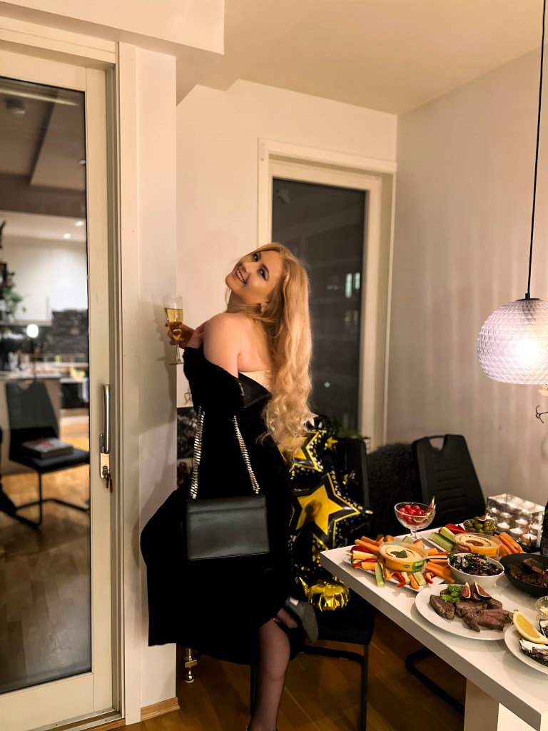 Woman in a black dress at New Years