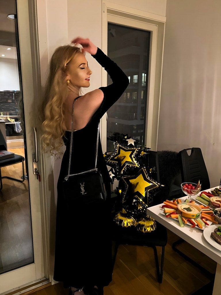 Woman in a black dress at New Years