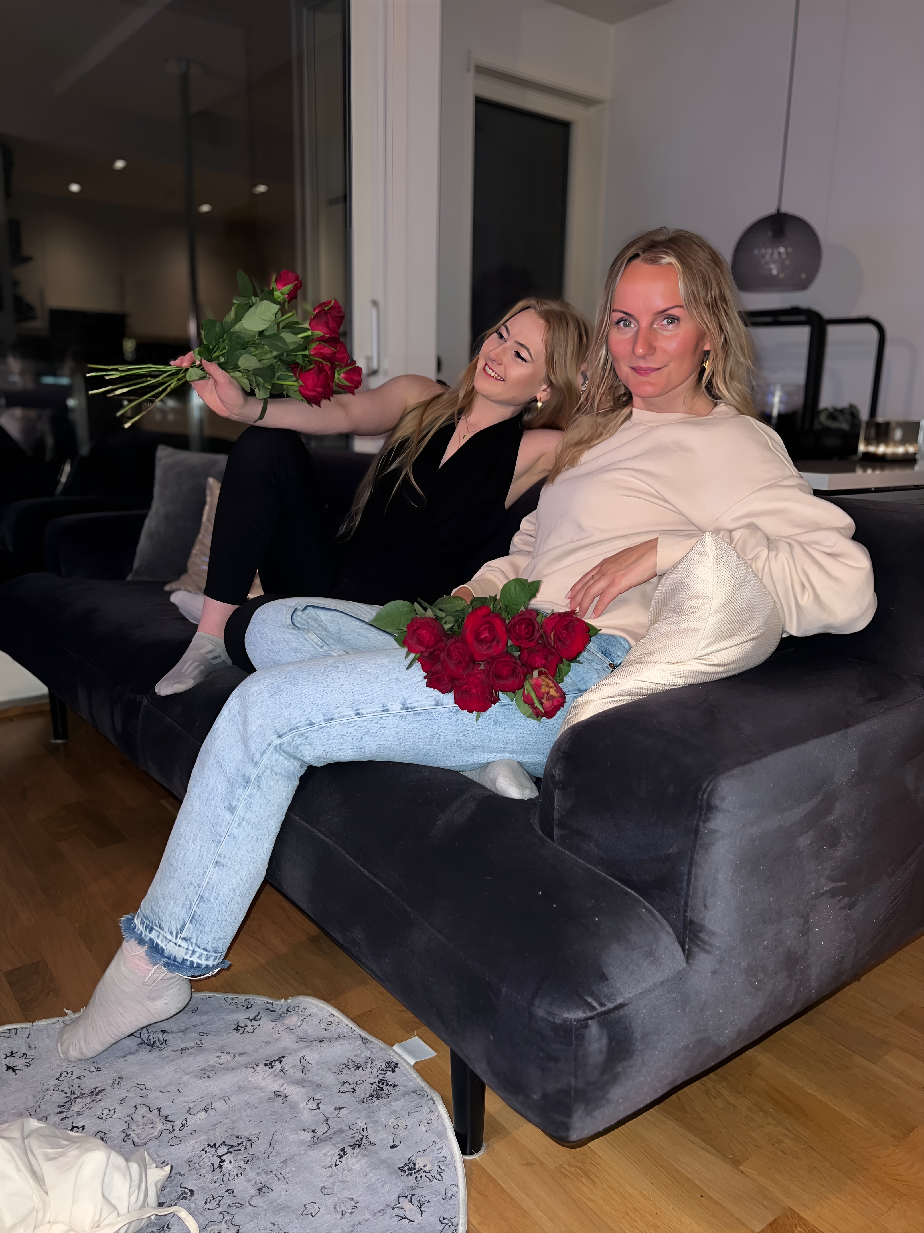 Two ladies with flowers