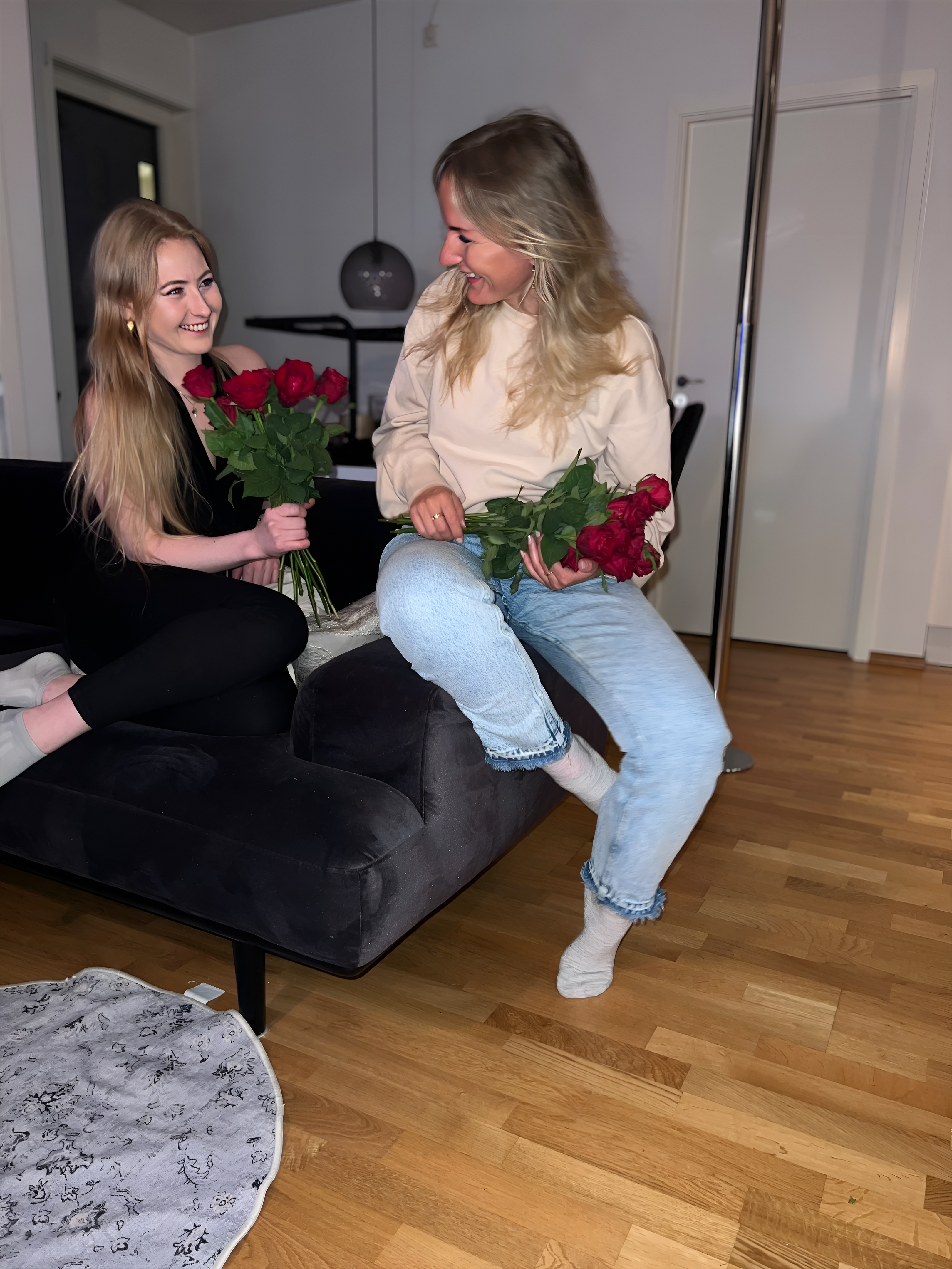 Two ladies with flowers